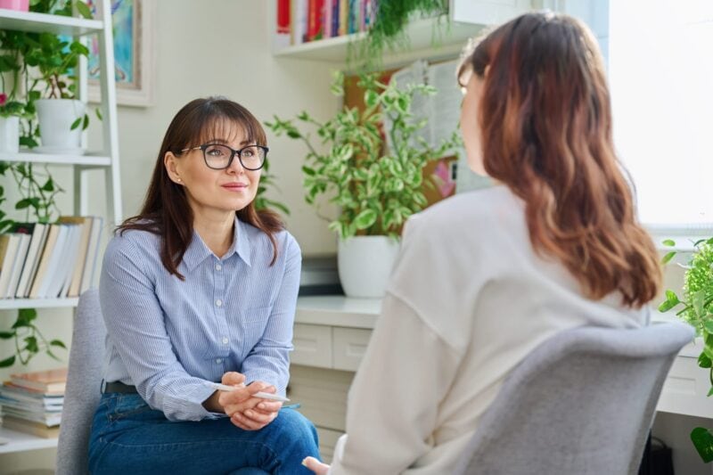 10 Ways To Improve Emotional Wellness 2 female-counselor-working-with-young adult
